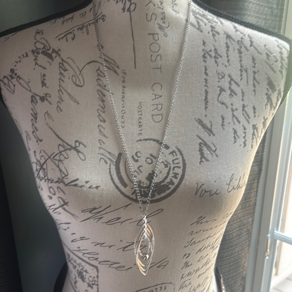 Silver Necklace with Intricate Detailing